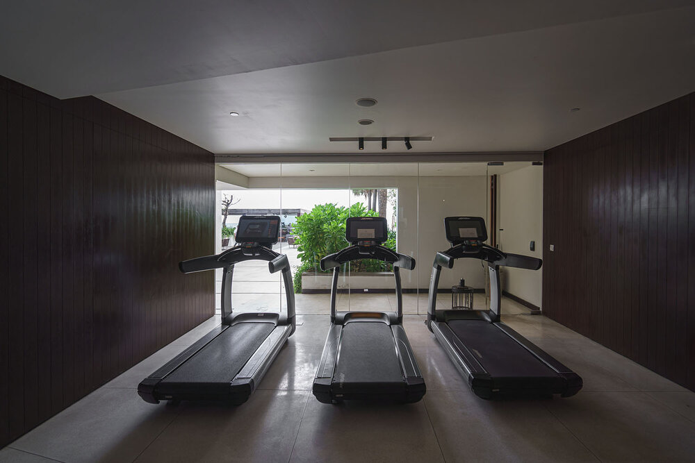  Treadmills facing the pool 