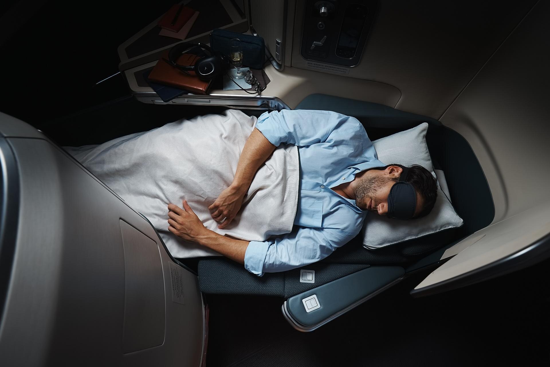 Cathay Pacific Reverse Herringbone seat in Bed Mode