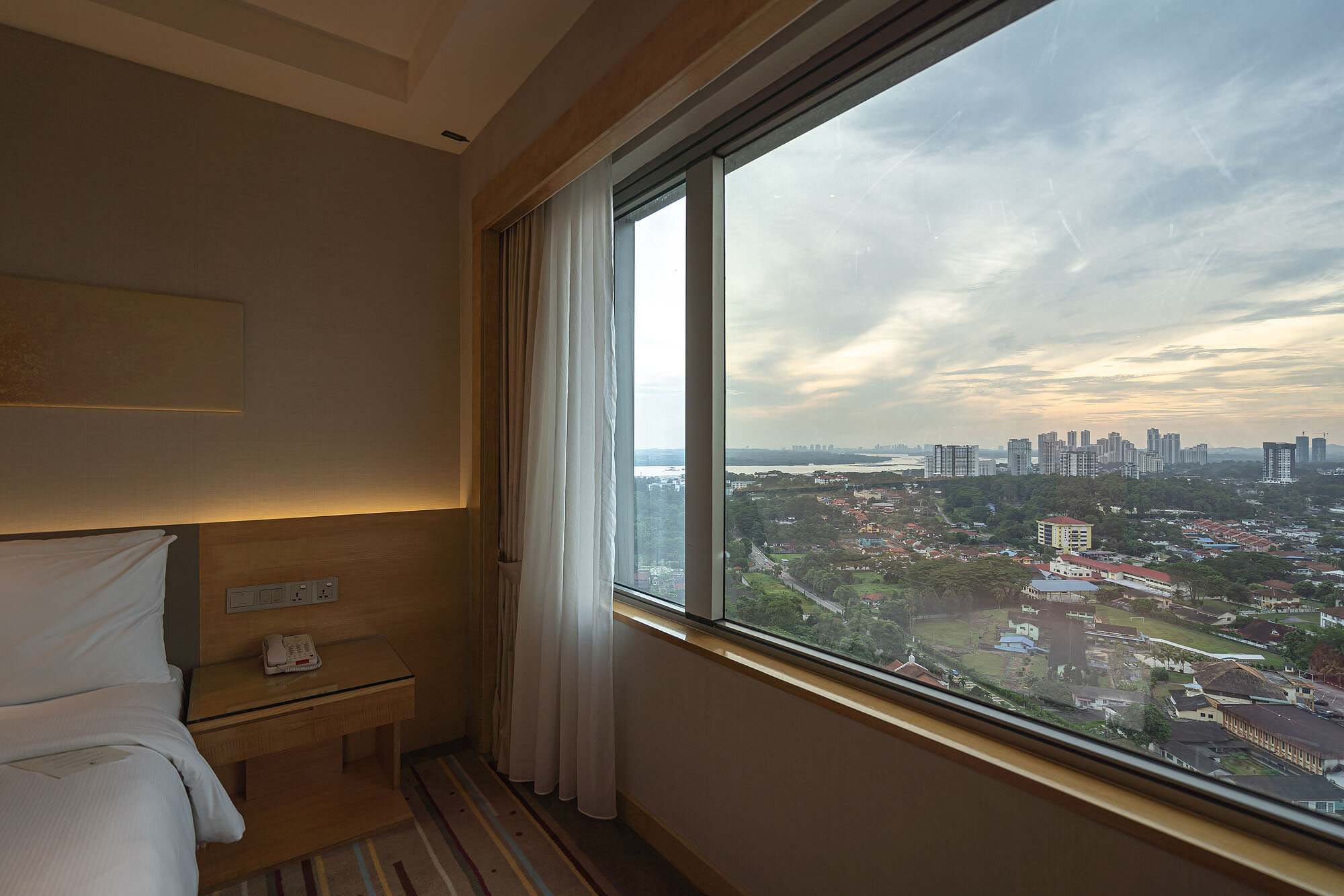 View of the sunset (and Singapore) from the bedroom