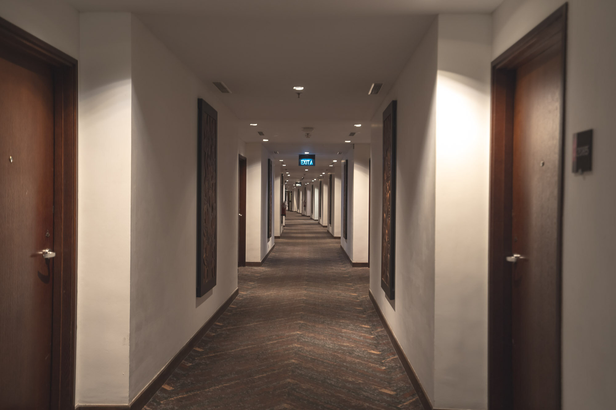 The corridor is very clean and shows the curvature of the building
