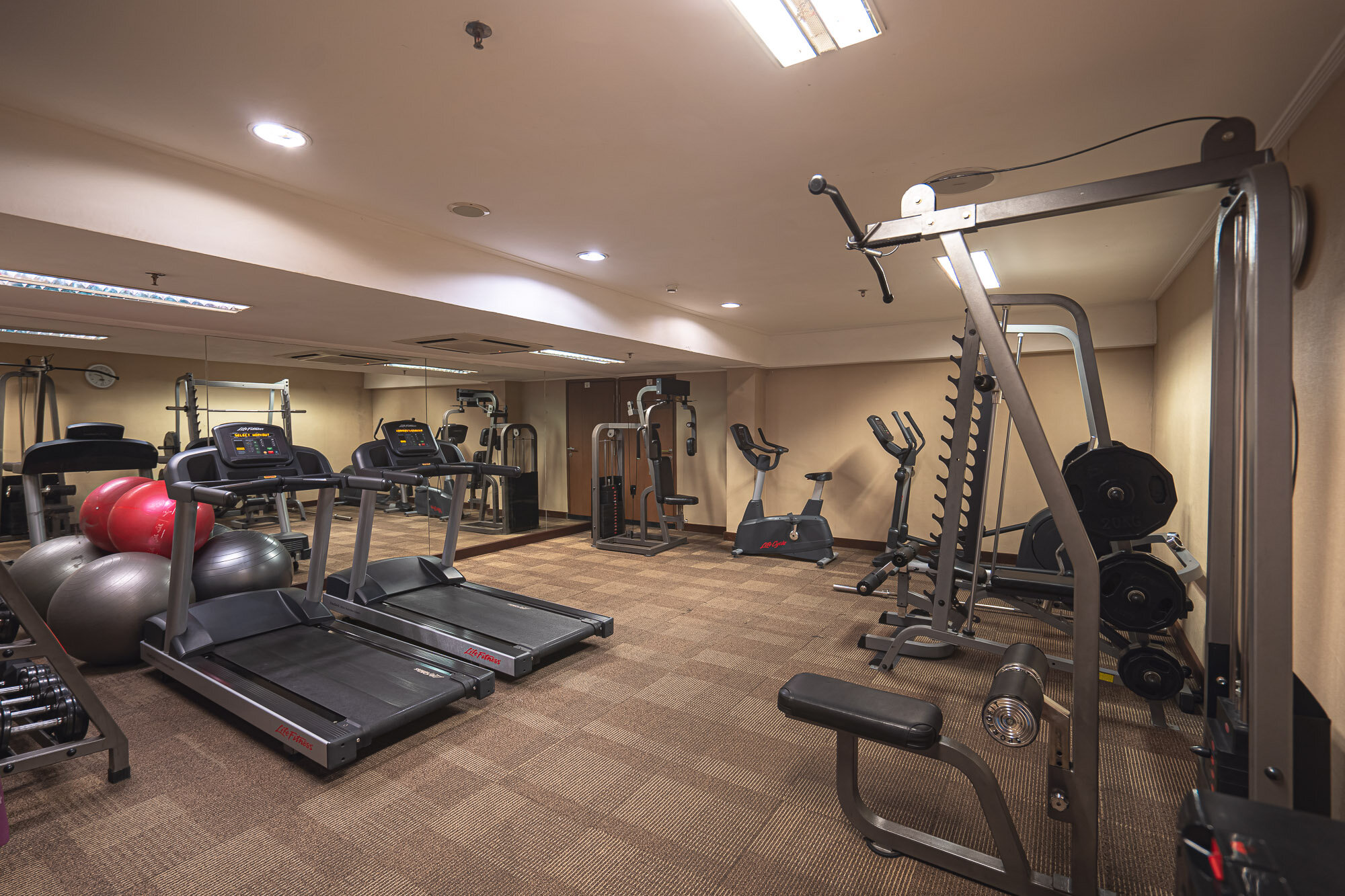 The gym is very small and equipments are positioned too close to one another
