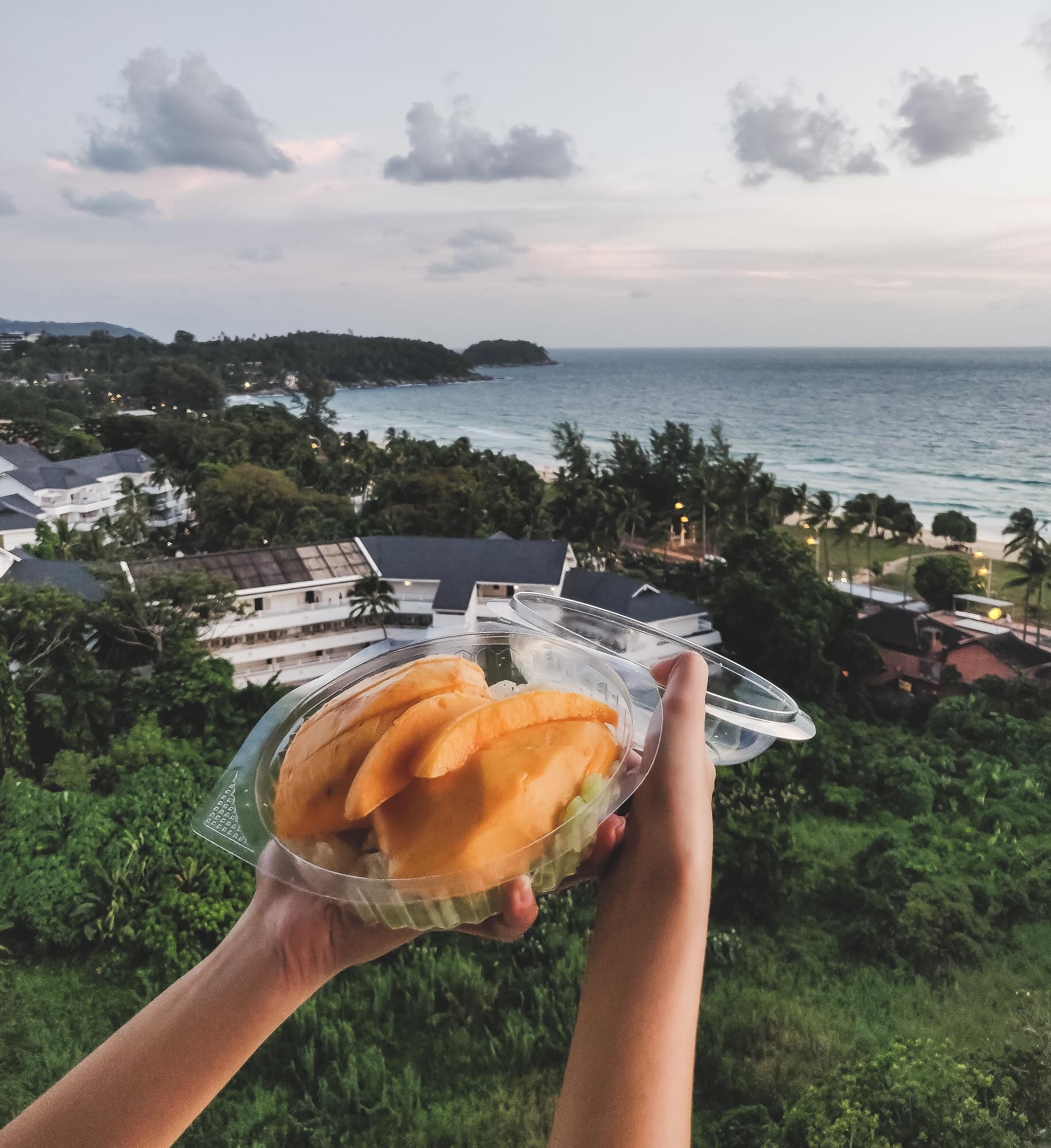 Our daily routine; watching the sunset while eating mango sticky rice
