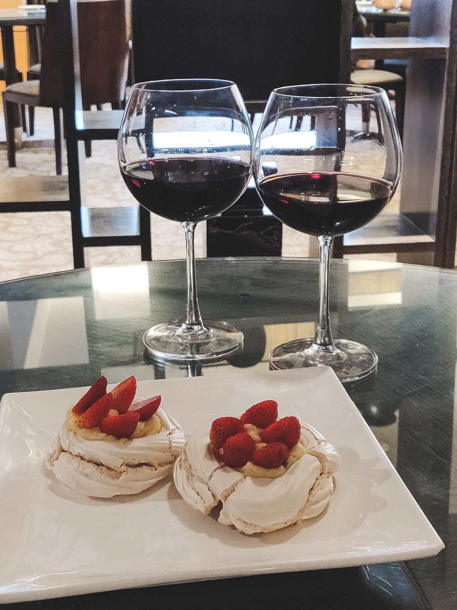 Pavlova with complimentary red wine in the Executive Lounge
